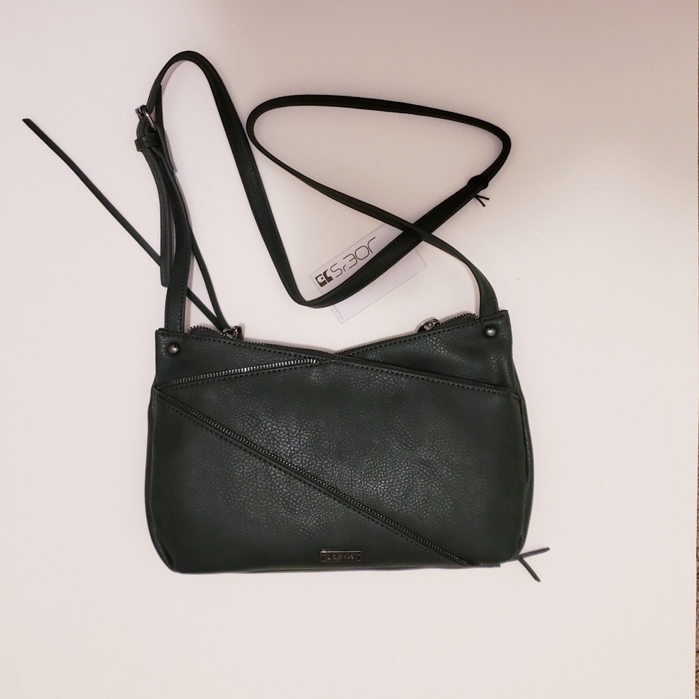 Brand new crossbody bag with decorative zips